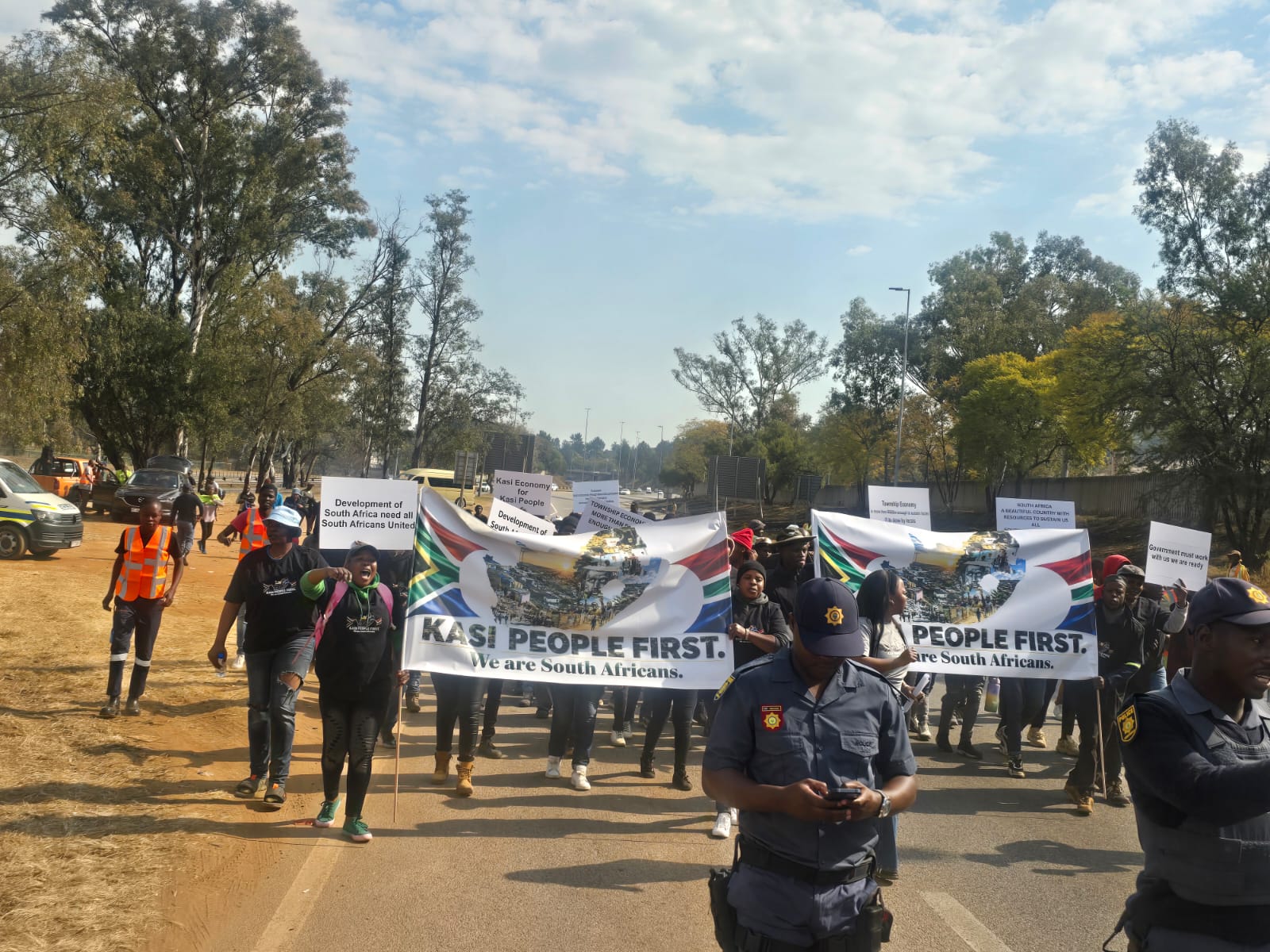 Kasi People's First members working together in the community